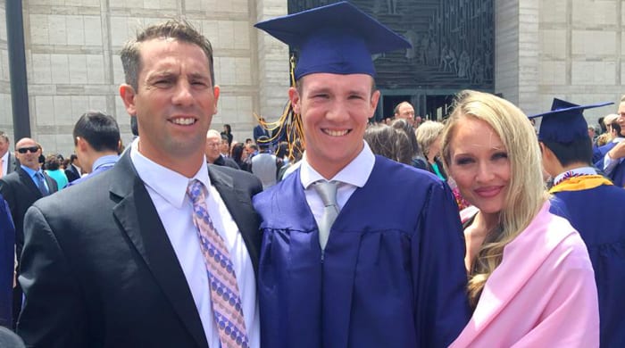 Calvin Riley and his parents, Sean and Kariann, on his high school graduation.